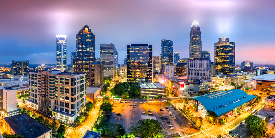 Aerial view of the Charlotte, North Carolina skyline on a foggy evening