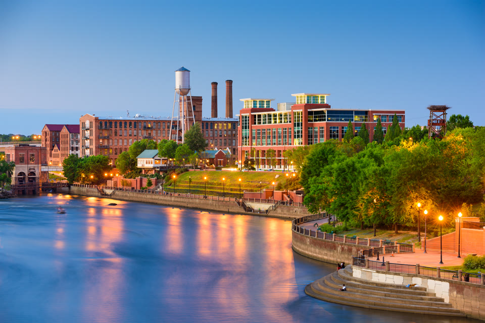 The historic mill, water tower, and riverwalk along the Chattahoochee River in Columbus, Georgia
