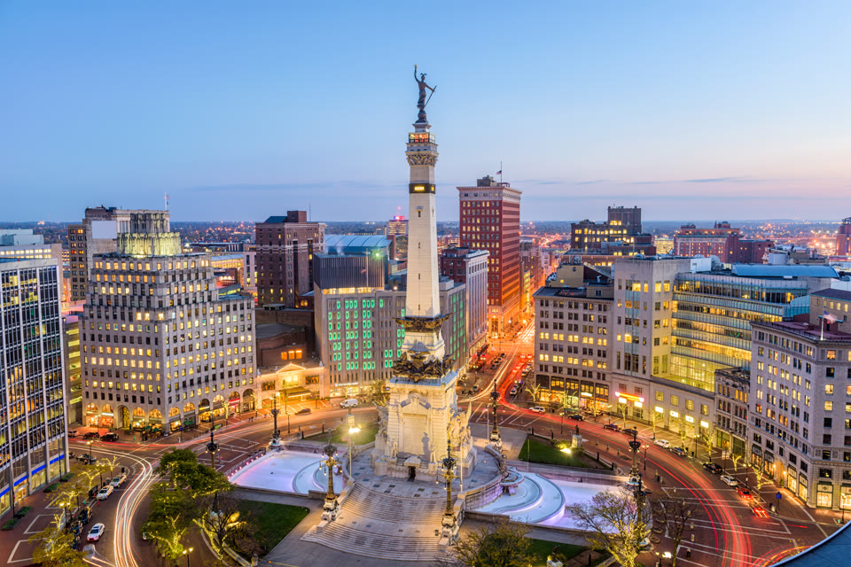 Monument Circle and the Soldiers' and Sailors' Monument in downtown Indianapolis at dusk