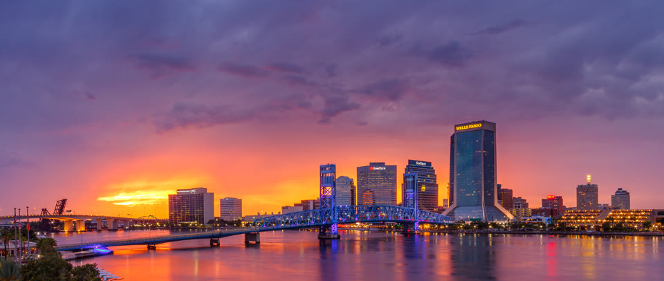 The Main Street Bridge over the St. Johns River in downtown Jacksonville, Florida at sunset