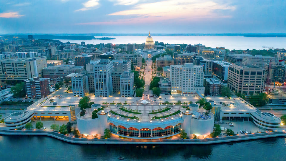 Aerial view of the Wisconsin State Capitol and Madison isthmus at dusk