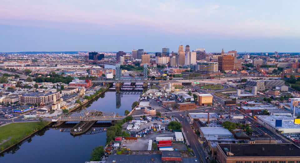 Dusk falls on the urban downtown metro area of Newark, New Jersey