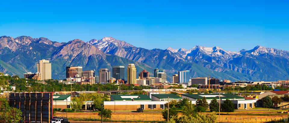 Skyline of downtown Salt Lake City with the Wasatch Range mountains behind it