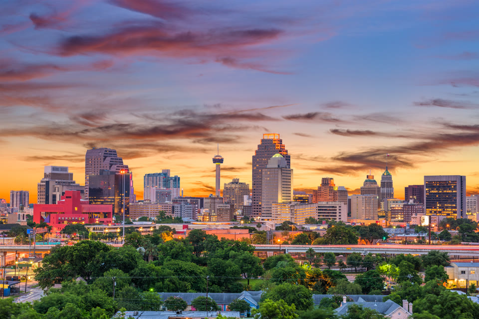 The Tower of the Americas rising above the San Antonio, Texas skyline at sunset