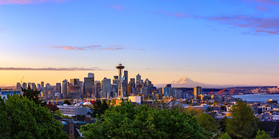 Sunrise over Seattle, Washington with the Space Needle and Mount Rainier