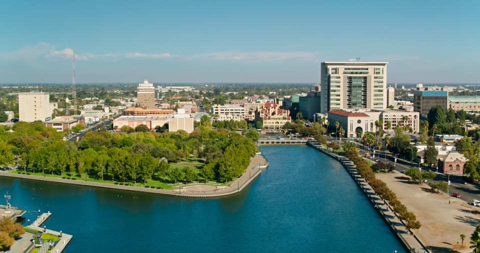 The Stockton Channel waterfront and downtown Stockton, California skyline
