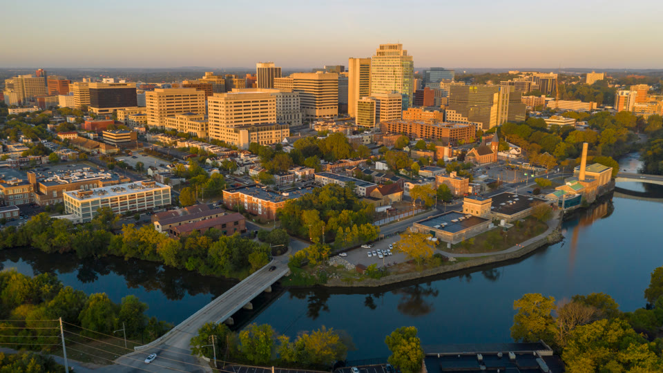 Downtown Wilmington, Delaware at golden hour along the Christina River